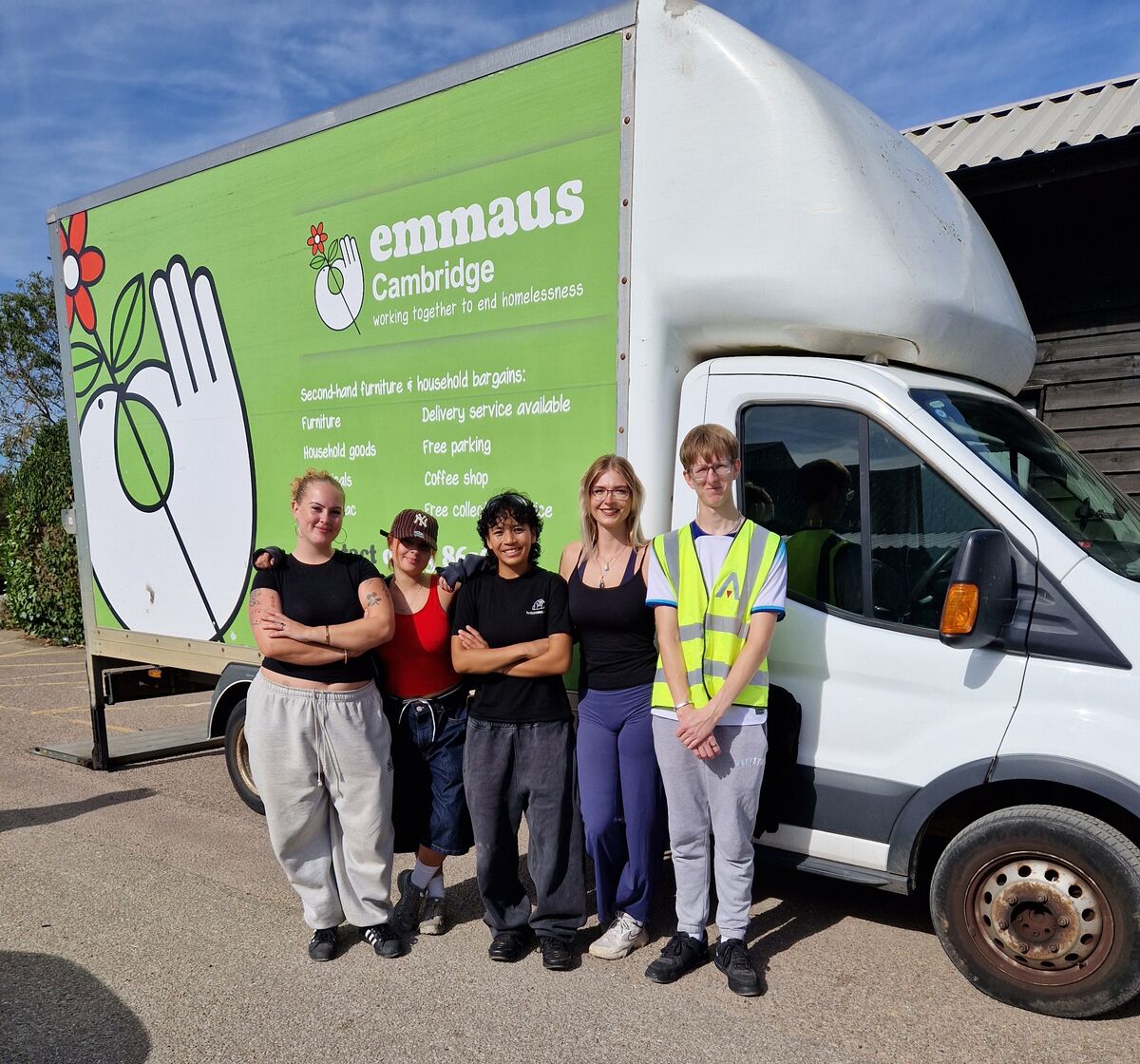 TU Cleaning Service team in front of the Emmaus Cambridge van after the charity walk